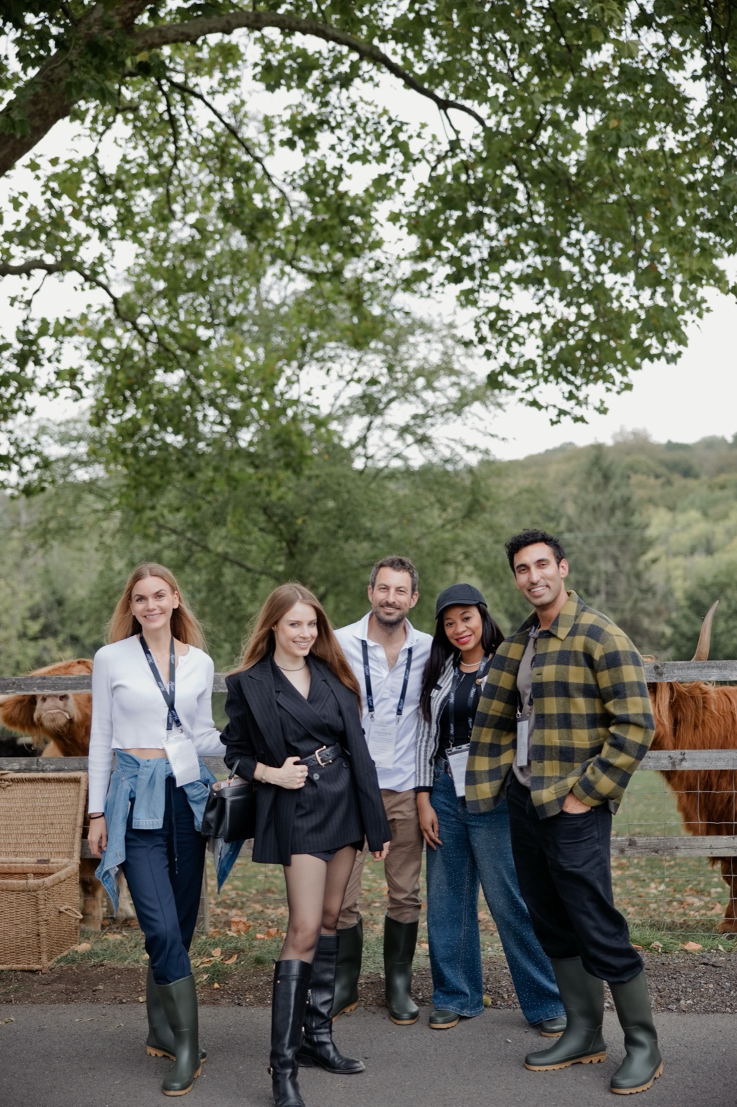 Xenia Tchoumi with fellow guests of The Hedsor Hundred beside the Highland cattle on the Hedsor estate